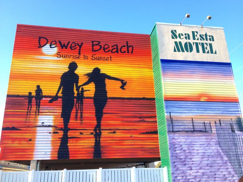 An old mural in Dewey Beach that was painted by local artist Andrew Dera in 2015.